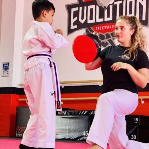 Ellie from Peterborough Martial Arts teaching Taekwondo
