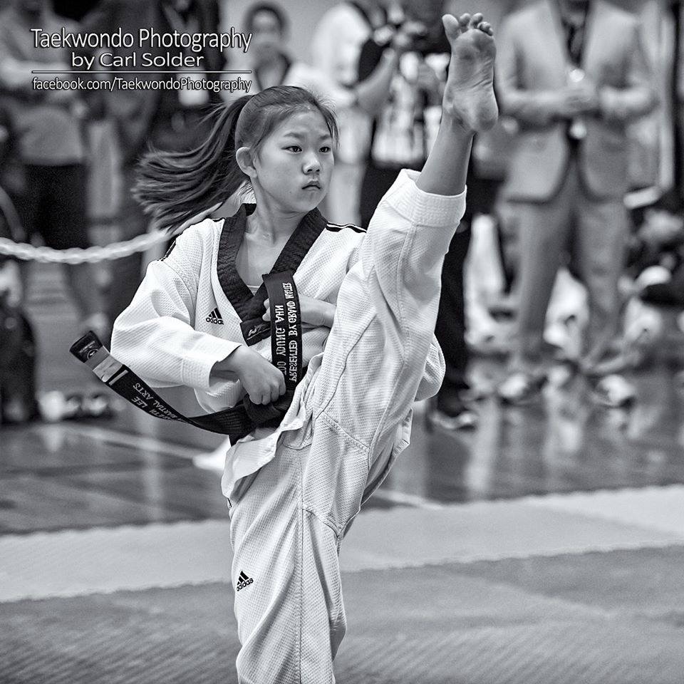 Girl doing taekwondo